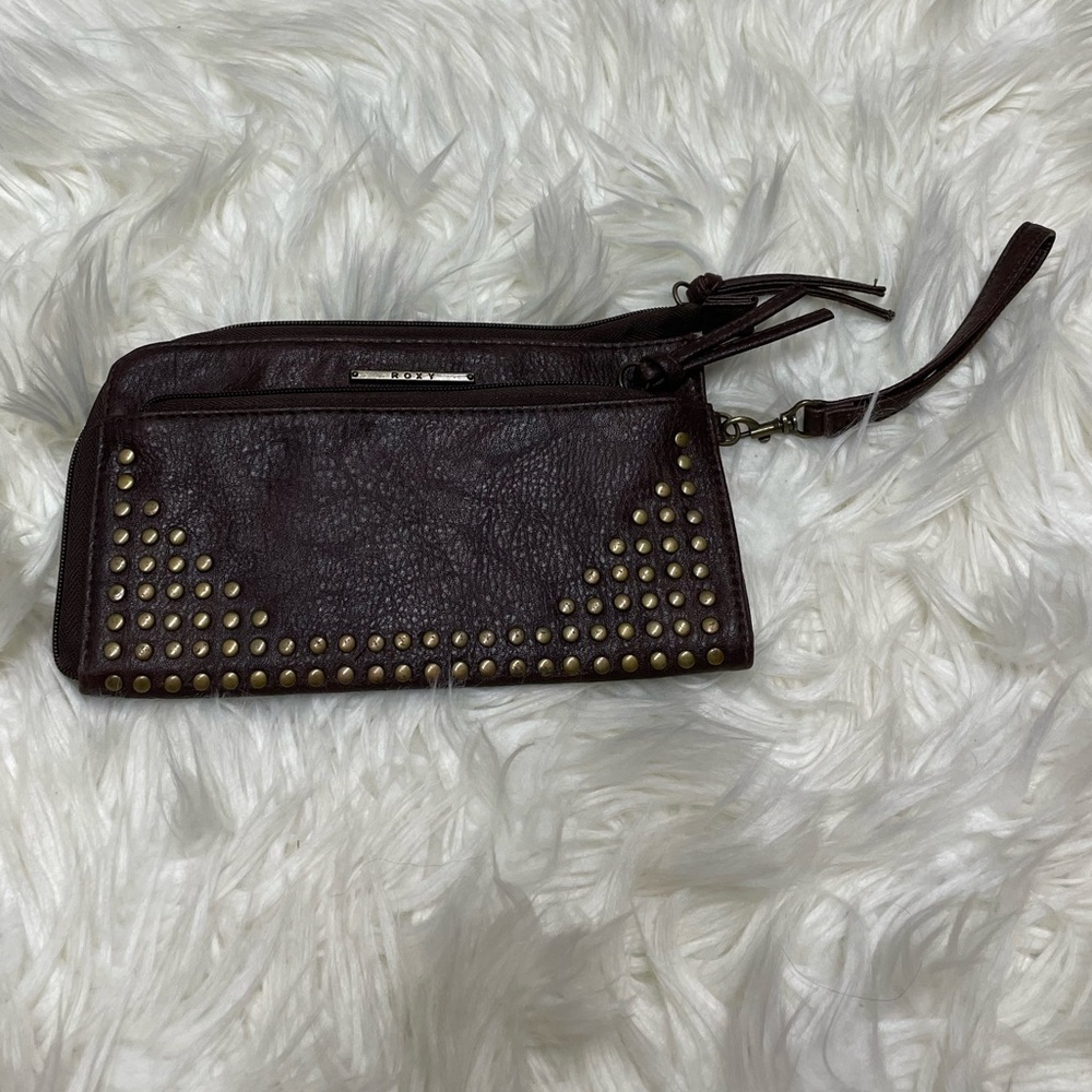 Roxy distressed wristlet w/ studded details